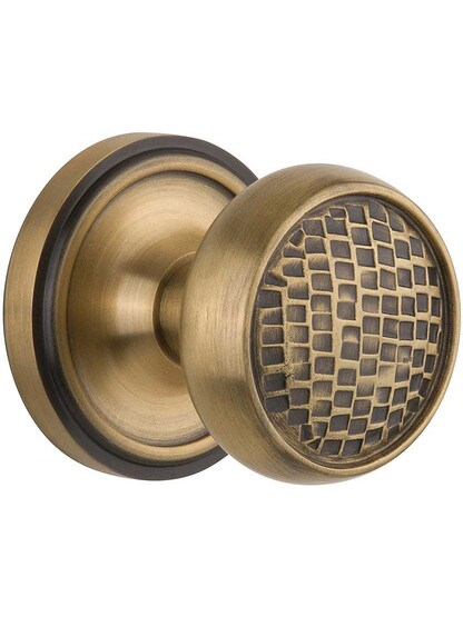 Classic Rosette Door Set with Pasadena Knobs in Antique Brass.